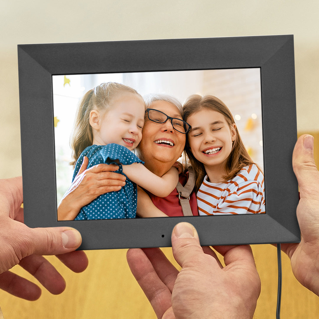 framed picture of happy senior and 2 kids