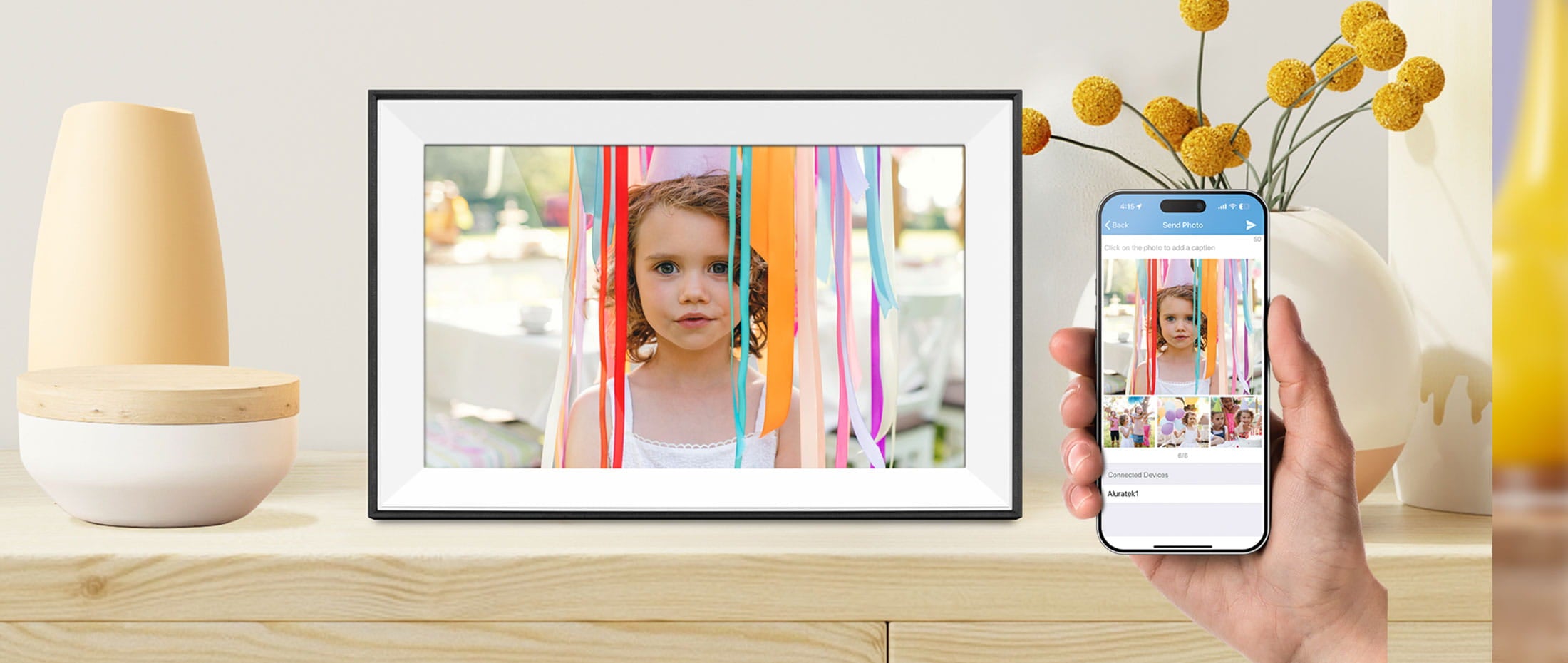 Load video: Aluratek 10.1-inch WiFi Digital Photo Frame on Desk with App and Plants, and Bowl