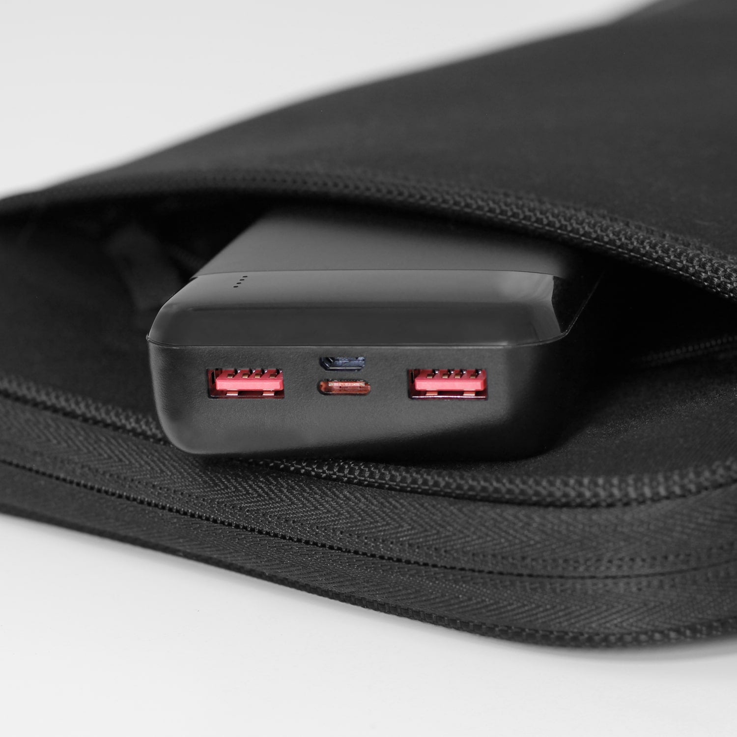 20,000 mAh Portable Battery Charger with Qualcomm Quick Charge 3.0 on a bag